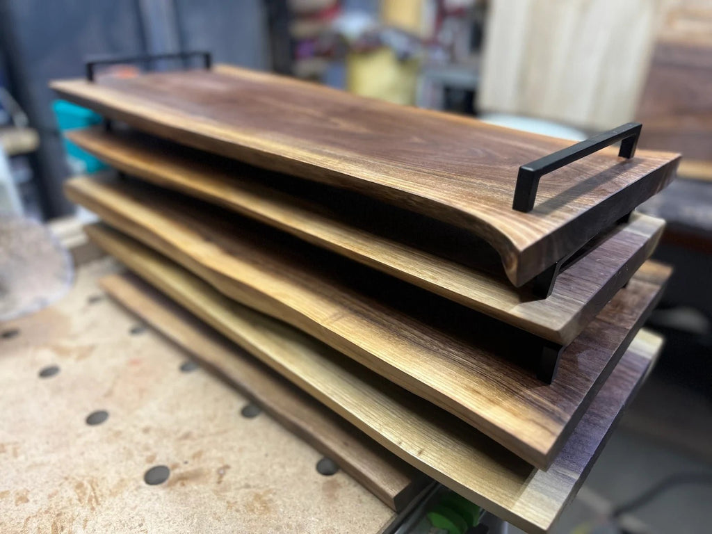 Large solid wood serving tray with handles and natural edge